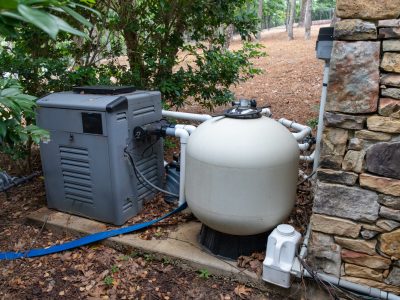 Pool pump and filtering equipment for maintaining a clean swimming pool